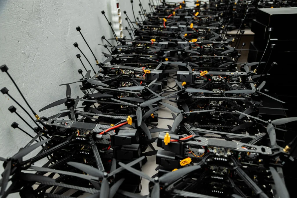 Warehouse with black drones