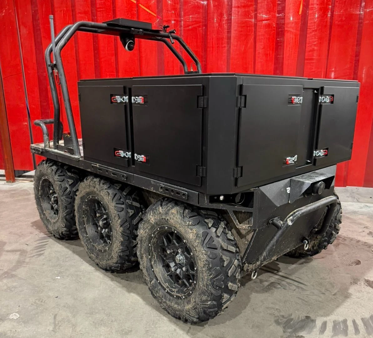 Ratel H UGV integrated with FPV drone launch module